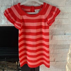 Pink and coral stripe in A-line sweater dress.